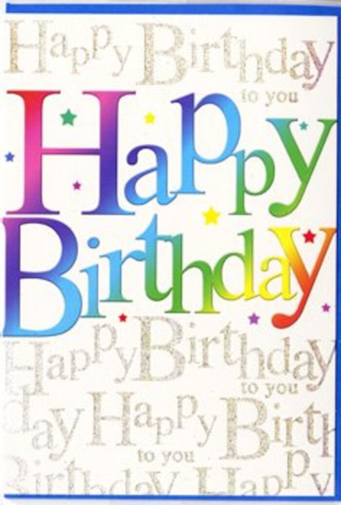 The image shows a joyful birthday card whose front design feels like a miniature party scene, crafted with the same care you'd expect from an experienced florist in Chingford arranging a celebratory bouquet. Across the centre, the words Happy Birthday appear in large, confident letters that immediately draw the eye. Each letter is filled with a smooth gradient of colour-imagine starting with a deep, juicy red at one edge, melting into coral, then bright tangerine, sunflower yellow, fresh lime, cool turquoise, and finally finishing in a rich indigo and violet. The colours blend so seamlessly that they resemble a painter's brushstroke or the harmonious mix of blooms in a rainbow-themed flower arrangement you might see near Chingford Mount. Surrounding this central phrase, the background is a soft, light tone overlaid with finely repeated words: Happy Birthday to you, written in a looping, cursive script. These smaller words are printed in a gentle metallic gold that shimmers like sunlight catching the surface of the River Ching, giving the card a delicate sparkle without overwhelming the main message. The script repeats in neat, wavy lines across the card, creating a subtle texture and the sense of many voices joining together in song. The surface looks smooth and slightly glossy, with the main letters likely a touch raised, offering a faint embossed feel under the fingertips. Overall, the composition feels bright, modern, and inclusive, ideal for a milestone birthday or a simple, joyful greeting to be paired with same-day birthday flowers delivered anywhere across Chingford and the tree-lined streets towards Highams Park.